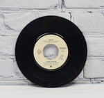 Warner Bros. Records 1980 Winchester Pressing - Devo "Whip It / Turn Around" 45 RPM 7" Record